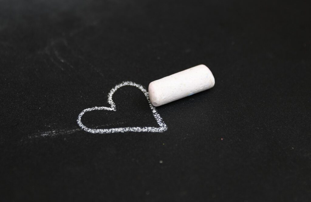 a chalk drawing of a heart
enduring the heat